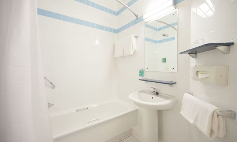 Guest bathroom with shower at Leonardo Hotel Leeds.