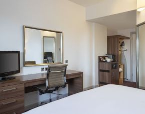 Day use room with work desk, coffee maker and cabinet at Leonardo Hotel Leeds.