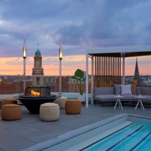 Outdoor pool and lounge at Hotel Zena Washington DC.