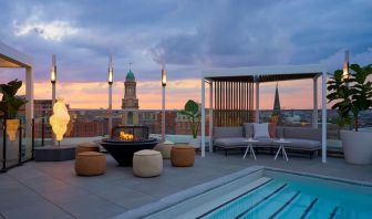 Outdoor pool and lounge at Hotel Zena Washington DC.