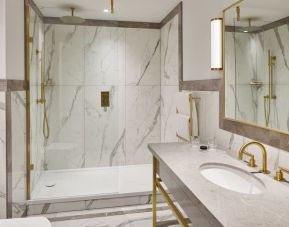 Guest bathroom with shower at The Grand Brighton. 