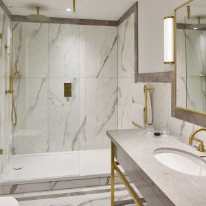 Guest bathroom with shower at The Grand Brighton. 