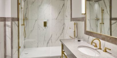 Guest bathroom with shower at The Grand Brighton. 