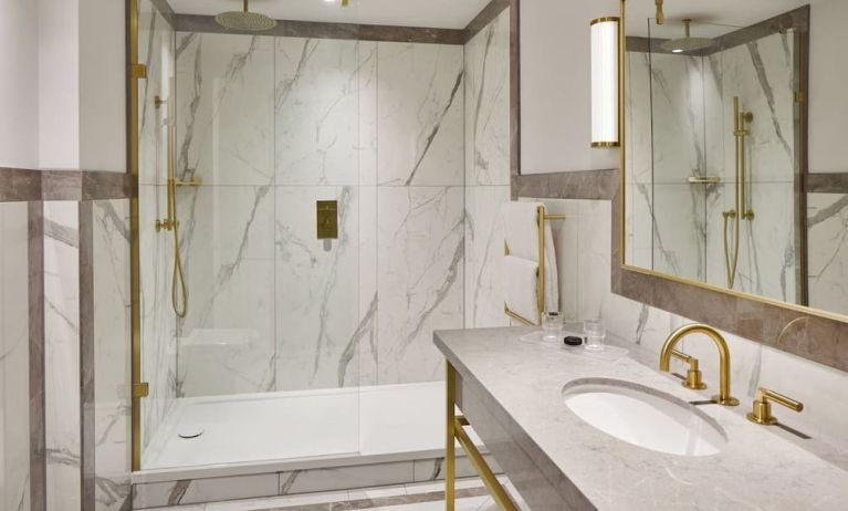 Guest bathroom with shower at The Grand Brighton. 