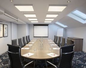 Professional meeting room at Leonardo Hotel London Heathrow Airport.