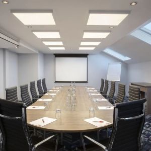 Professional meeting room at Leonardo Hotel London Heathrow Airport.