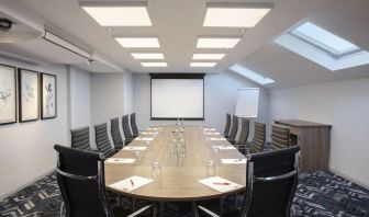 Professional meeting room at Leonardo Hotel London Heathrow Airport.