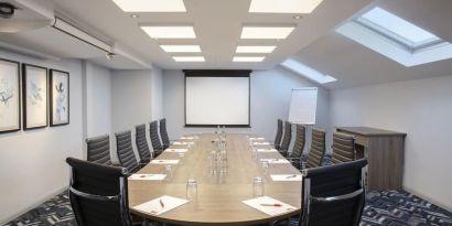 Professional meeting room at Leonardo Hotel London Heathrow Airport.