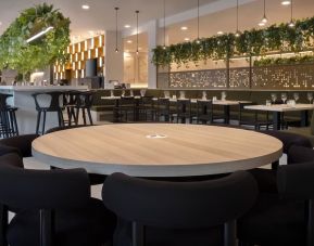 Dining area perfect for coworking at Leonardo Hotel Manchester Piccadilly. 