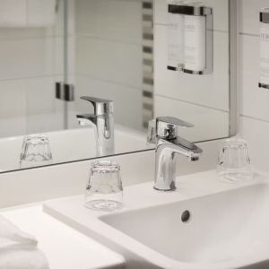 Guest bathroom with shower at Leonardo Hotel Manchester Piccadilly. 