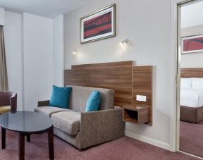 King suite with lounge at Leonardo Hotel Newcastle.