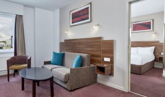 King suite with lounge at Leonardo Hotel Newcastle.