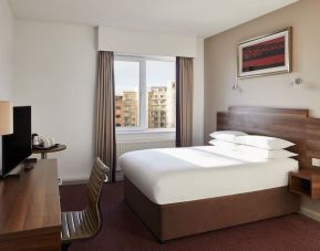 King bed with natural light at Leonardo Hotel Newcastle.