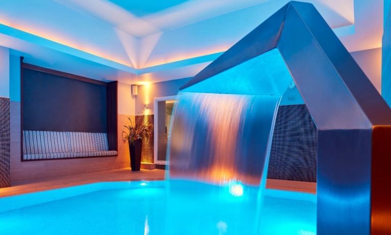 Relaxing indoor pool with swan neck fountain  at The Midland - A Leonardo Royal Hotel.