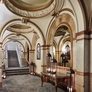 Ornate hotel hallway with arched ceilings and marble accents at The Midland - A Leonardo Royal Hotel.