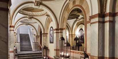 Ornate hotel hallway with arched ceilings and marble accents at The Midland - A Leonardo Royal Hotel.