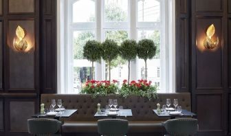 Dining area with natural light at The Midland - A Leonardo Royal Hotel.