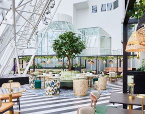 Spacious dining area with natural light perfect for coworking at Leonardo Hotel Southampton Grand Harbour.