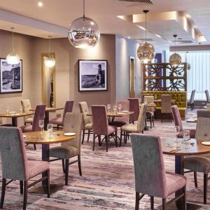 Dining area perfect for coworking at Leonardo Hotel Milton Keynes.