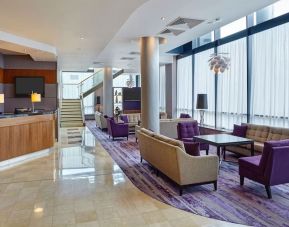 Lobby and coworking lounge at Leonardo Hotel Milton Keynes.