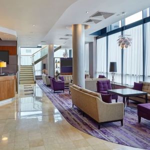 Lobby and coworking lounge at Leonardo Hotel Milton Keynes.