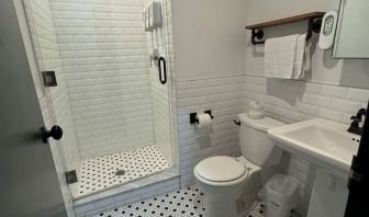 Guest bathroom with shower at Tribeca Hotel FiDi.