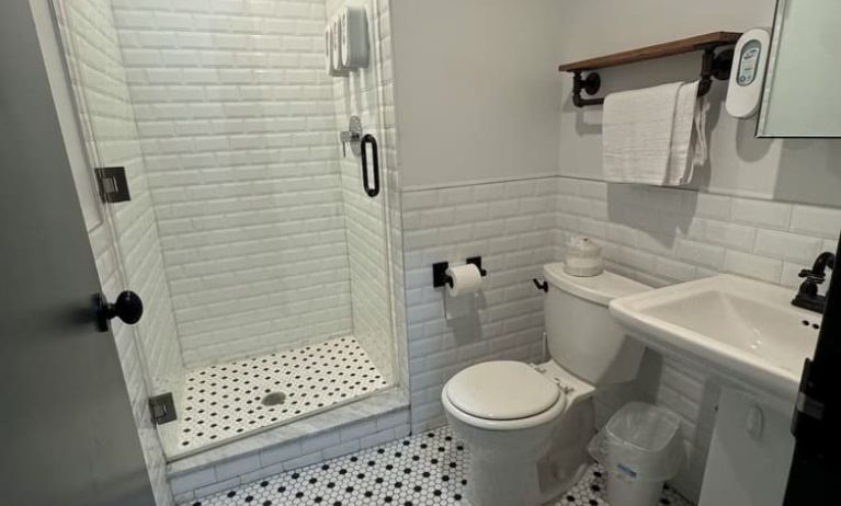 Guest bathroom with shower at Tribeca Hotel FiDi.