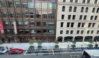 City view from day use room at Tribeca Hotel FiDi.