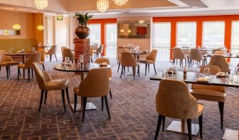 Dining area perfect for coworking at Hilton Northampton.