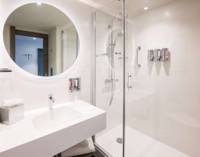 Guest bathroom with shower at Hampton By Hilton Blackpool.