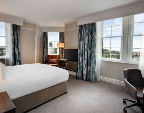 Day use room with large windows and work desk at Hilton Edinburgh Carlton.