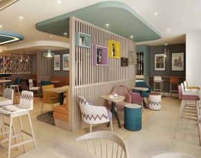 Lobby and coworking lounge at Hampton By Hilton London City.