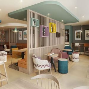 Lobby and coworking lounge at Hampton By Hilton London City.