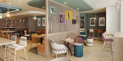 Lobby and coworking lounge at Hampton By Hilton London City.