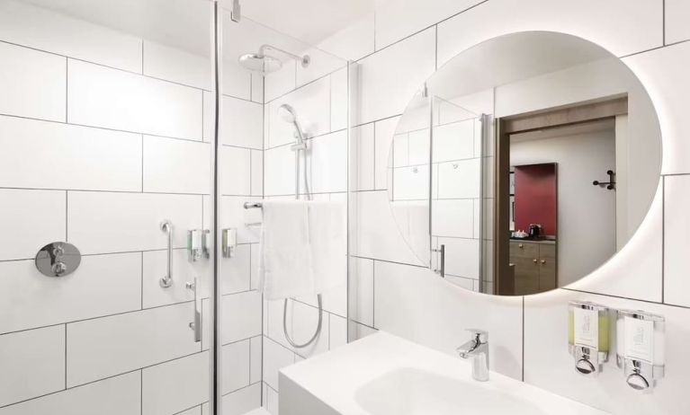 Guest bathroom with shower at Hampton By Hilton London City. 