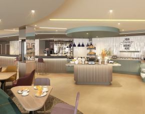 Dining area perfect for coworking at Hampton By Hilton London City.