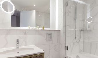 Guest bathroom with shower and tub at DoubleTree By Hilton Stoke On Trent.