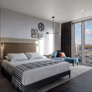 Bright king bedroom with view at The Gantry London, Curio Collection By Hilton.