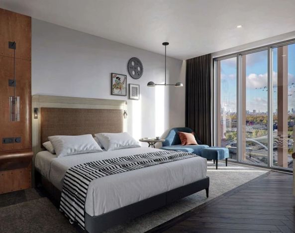 Bright king bedroom with view at The Gantry London, Curio Collection By Hilton.