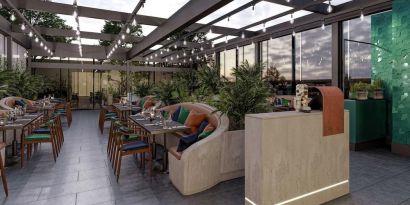 Dining area with natural light at The Gantry London, Curio Collection By Hilton.