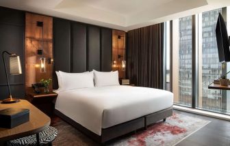 Modern day use room with natural light at The Gantry London, Curio Collection By Hilton.