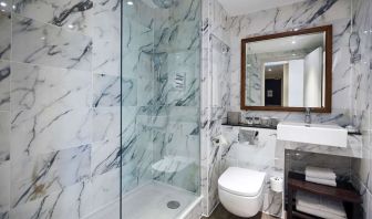 Guest bathroom with shower at DoubleTree By Hilton London Excel.
