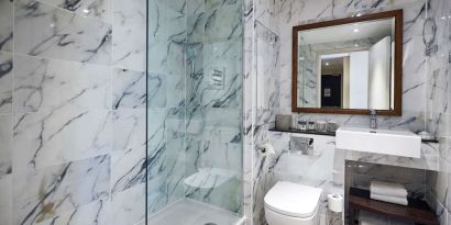 Guest bathroom with shower at DoubleTree By Hilton London Excel.
