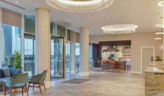 Lobby and coworking lounge at Hilton London Angel Islington.