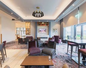 Lobby and coworking lounge at Hilton Garden Inn Birmingham Airport.