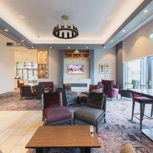 Lobby and coworking lounge at Hilton Garden Inn Birmingham Airport.