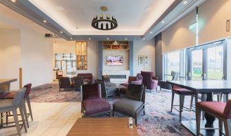 Lobby and coworking lounge at Hilton Garden Inn Birmingham Airport.