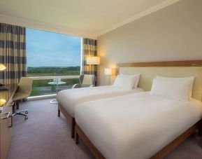 Double bed day use room with work desk and TV at the Hilton Reading.