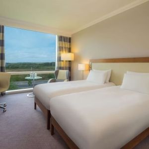 Double bed day use room with work desk and TV at the Hilton Reading.