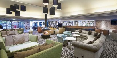 Lobby workspace with lounges at the DoubleTree by Hilton Newbury North.